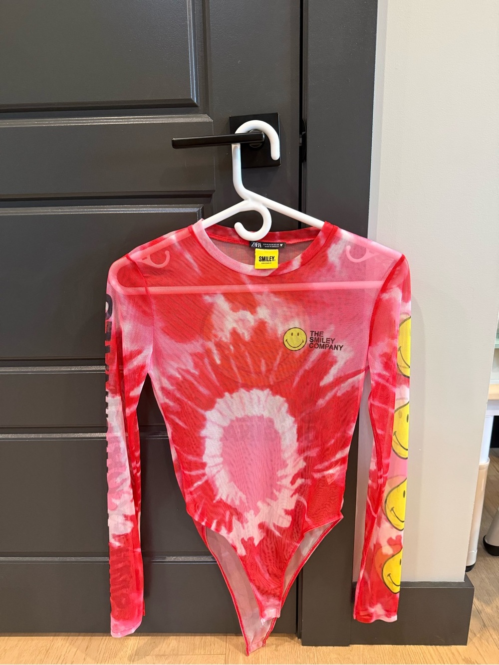 Zara Red Tie-Dye Long Sleeve Bodysuit with Yellow Smiley Graphic